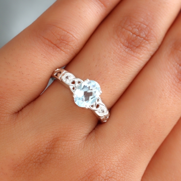 Jewelry - STERLING SILVER BLUE TOPAZ RING